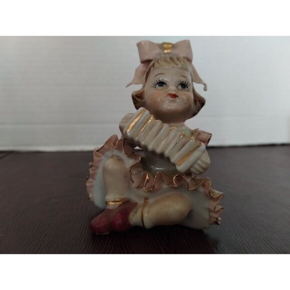 Vintage Ceramic Figurine Of Girl With Accordion & Pink Bow - Picture 1 of 7